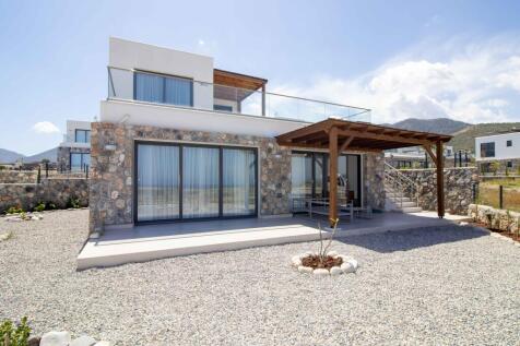 Brand new 3 bedroom contemporary designed resale villa located on top of a beautiful sandy beach sea views Image 9999 1
