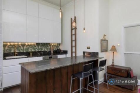 Kitchen Showing Breakfast Bar