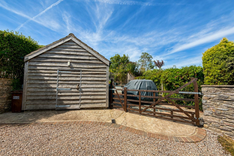 Driveway &amp; Garage From Lane.png