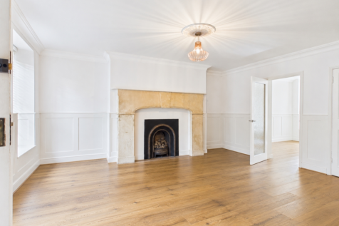 Empty room with preserved architectural details