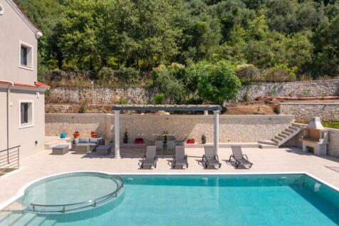 Pool to covered terrace