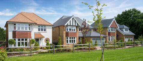 Redrow Paddock Green street scene with detached homes complete with landscaped front gardens