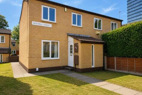 Charming exterior with a bright front lawn....