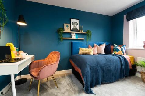 Utilise bedroom three as a bedroom with a workspace
