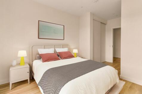 Experience tranquility in this beautifully designed bedroom that offers a perfect blend of comfort and style.