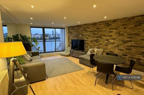 Living Room And Balcony With Views To The River