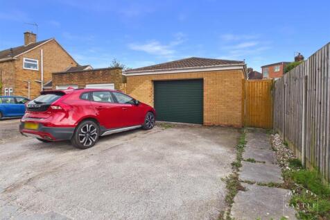 OUTSIDE - DOUBLE GARAGE