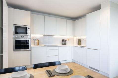 Experience the elegance of a sleek, modern kitchen perfect for any contemporary home.