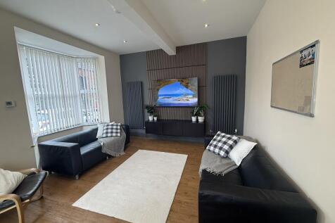Living  Area with 65 Inch TV