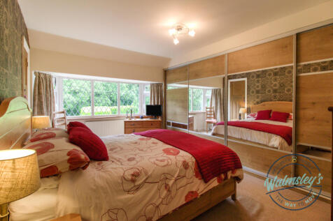 Main bedroom with fitted wardrobes