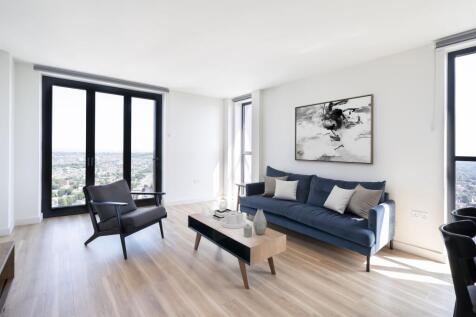 Experience the elegance of this chic urban living room with stunning city views.