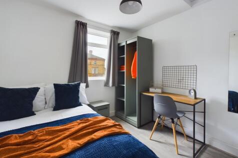 A stylish and inviting double bedroom offering ...