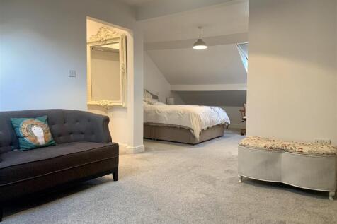 Bedroom Two and seating area.JPG