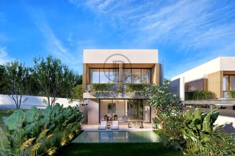 Modern two-story house with large windows, surroun