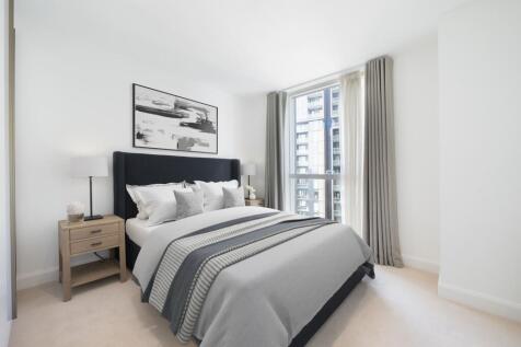 Experience the blend of comfort and style in this luxurious bedroom space.