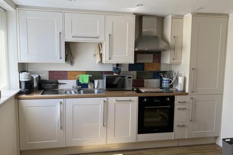 Kitchen with integrated appliances