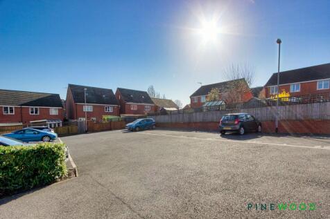 Communal Car Park to Rear