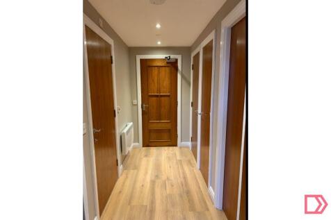 Hallway with storage cupboard