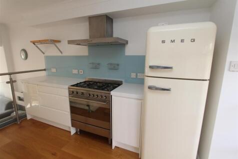 Modern kitchen with stylish Smeg refrigerator...
