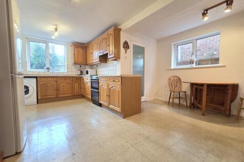 Kitchen With Dining Area