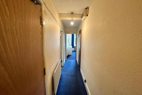 A well-maintained hallway providing access to v...