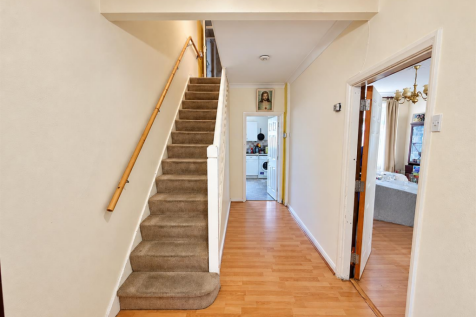 Bright Tidy Hallway with Staircase.png