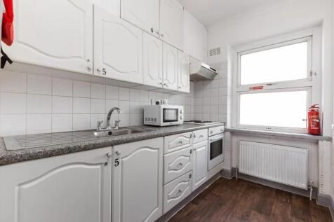 Bright kitchen with ample cabinet storage....
