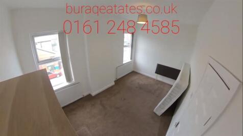 Bright, simply furnished upstairs bedroom with ...