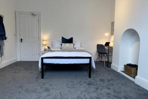 A spacious and stylish large double bedroom, pe...