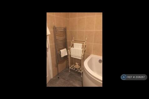 Spacious Bathroom Corner Bath And Shower 