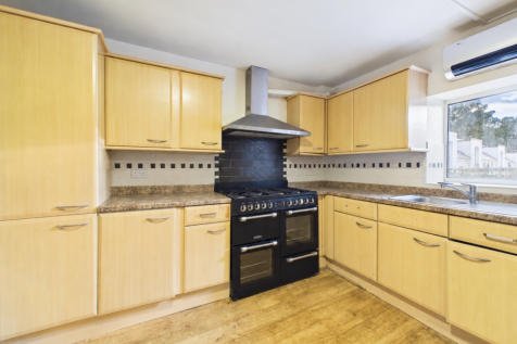 Bright kitchen with cleared countertops