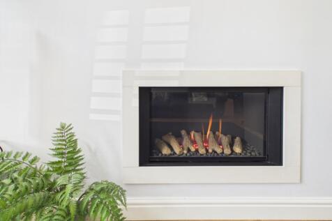 Modern remote controlled gas fire in the lounge to