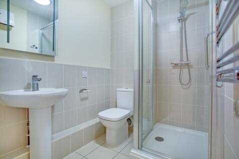 a bathroom with a glass shower