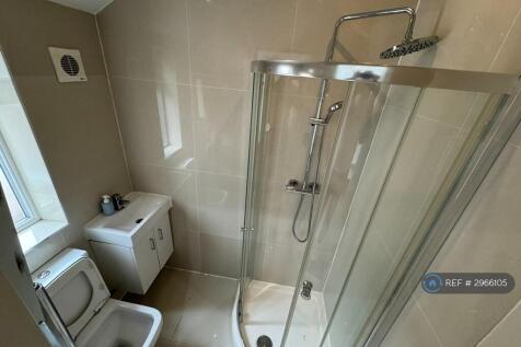 Bathroom With Waterfall Shower