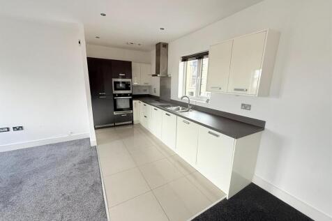 Lounge Open Plan to Kitchen