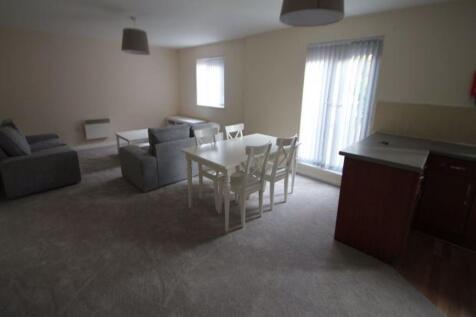Spacious open-plan living and dining area with ...
