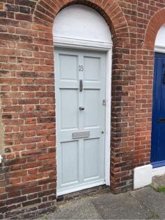 Charming brick exterior with a stylish front do...