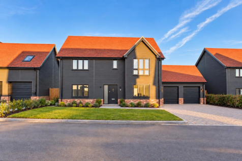 Modern Charcoal Home with Recessed Garage.png