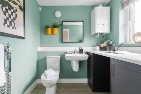 A guest cloakroom completes the ground floor