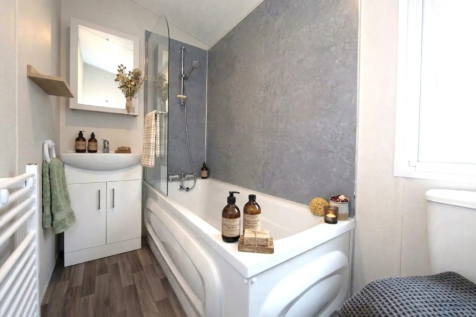 Modern Family Bathroom With Bath And Overhead Show