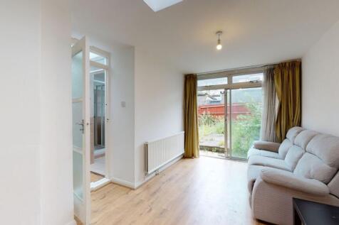Bright room with sofa and direct garden access...