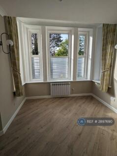 Open Plan Living Room With Beautiful Bay Windows