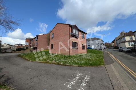 Side of property leading to parking area