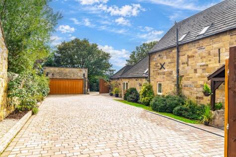A generous stone driveway