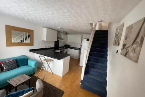 A spacious and inviting large modern living roo...