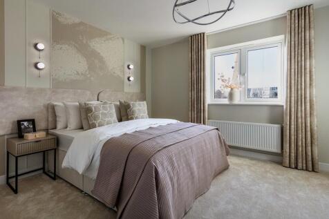 Bedroom one is spacious and inviting