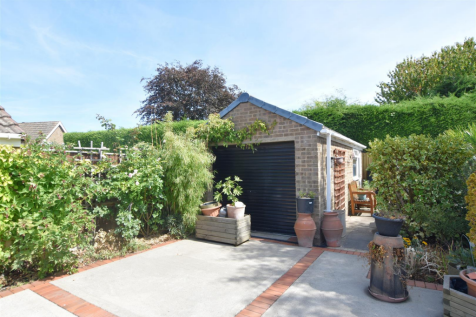 DETACHED BRICK GARAGE