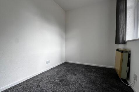 Bright room with fresh carpet and natural light...