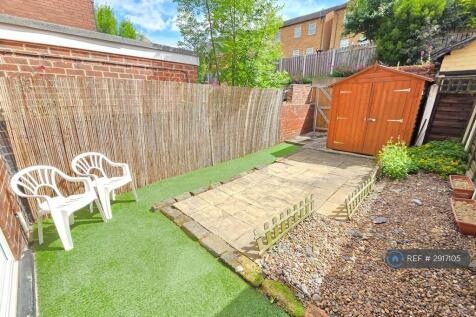 Gravel And Faux Grass Garden