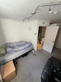 Cozy bedroom with convenient en-suite access...